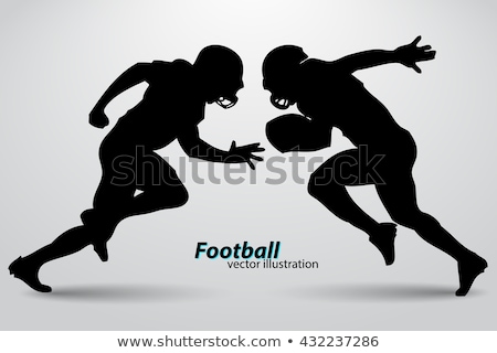 Foto stock: American Football Player About To Throw The Ball