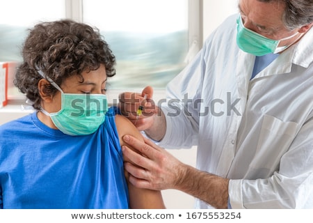 Stockfoto: Doctor Giving Injection On Womans Face