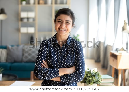 Stok fotoğraf: Female Employee Posing With Crossed Arms