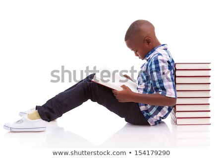 Stock fotó: African American School Boy Reading A Book - Black People