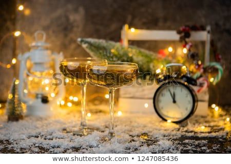 Zdjęcia stock: Two Champagne Glasses Christmas Decor And Clock