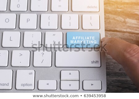 Stok fotoğraf: Affiliate Marketing Closeup Of Blue Keyboard Key 3d