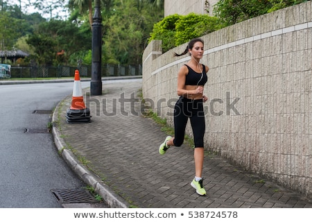 Stock photo: Young Women Running In Urban Area