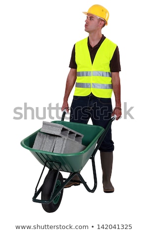 Stock fotó: Mason Carrying Cinderblocks