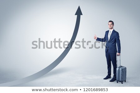 Stock photo: Businessman Hitchhiking With Progressive Arrow