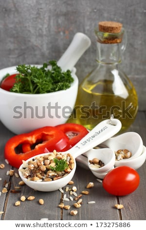 Stock photo: Uncooked Multigrain Rice In Porcelain Measuring Spoons With Raw Vegetable