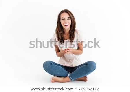 Stok fotoğraf: Beautiful Oung Woman On The Floor Studio Shot