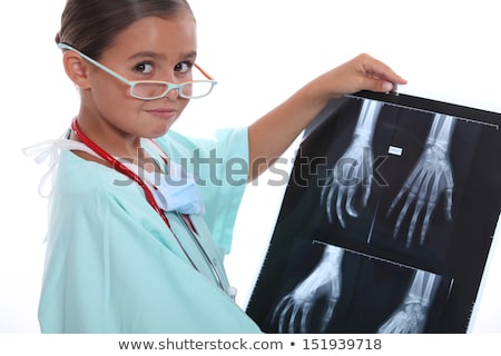 Stock fotó: Child Dressed As A Doctor In Scrubs