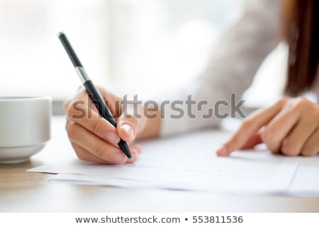 Сток-фото: Young Woman Signs A Contract
