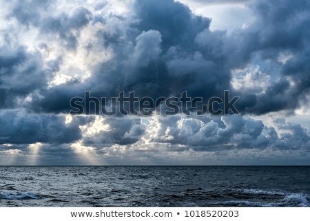 Foto stock: Cloud With Rain And Sun Abstract Background