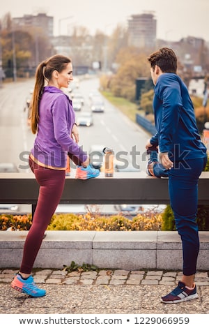 Zdjęcia stock: Athletic Couple Exercising For Better Fitness In The City