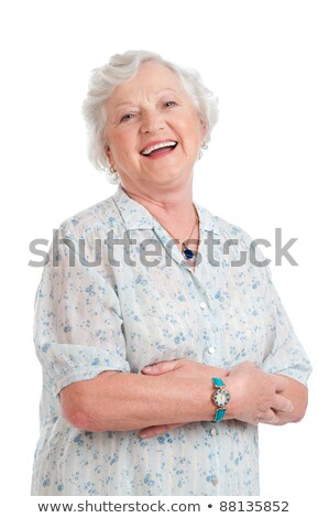 Foto stock: A Happy Joyful Senior Lady Looking At Camera And Smiling