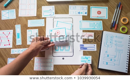 [[stock_photo]]: Hand Of Developer Working On Ui Design At Office