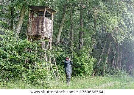 Foto stock: Hunter With His Binoculars