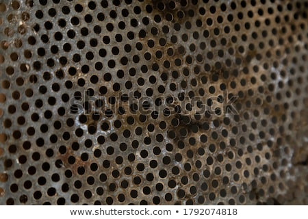 Stock photo: Rusty Perforated Metal Background