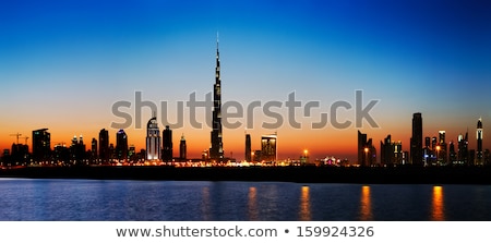 Stok fotoğraf: Dubai Skyline At Dusk Seen From The Gulf Coast