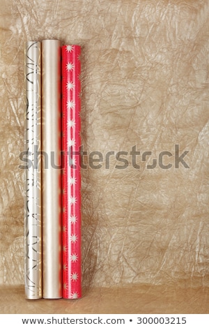 ストックフォト: Rolls Of Multicolored Wrapping Paper With Streamer For Gifts On