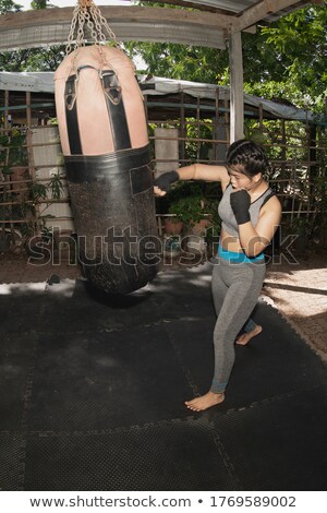 Stock photo: Young Woman Boxing Workout In An Old Building