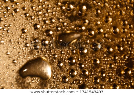 [[stock_photo]]: Raindrops On Gold