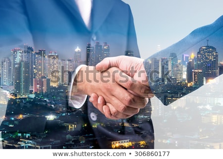 Сток-фото: Handshaking Business Person In Office Concept Of Teamwork And Partnership Double Exposure