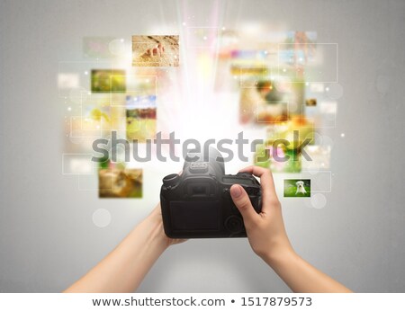 Stock photo: Hand Captures Life Events With Digital Camera