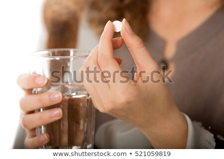 Stock fotó: Woman Feeling Sick Or Unwell And Taking Medication