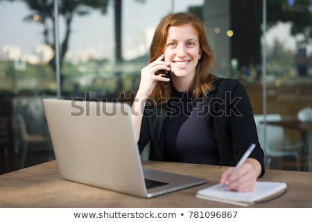 Foto d'archivio: Portrait Of A Working Woman Speaking On The Phone