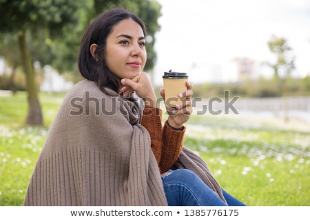 Stok fotoğraf: Woman Drinking Coffee In The Garden