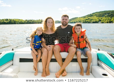 Сток-фото: Family Out Boating Together Having Fun On Vacancy