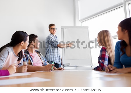 Stock photo: Group Of High School Students With Flip Chart