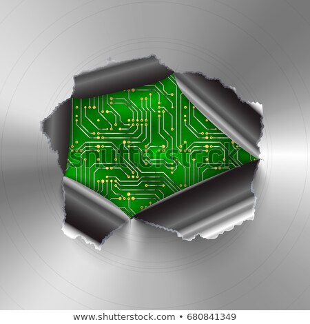 Stockfoto: Torn Hole In Glossy Round Polished Metal Plate On Complicated Computer Microchip