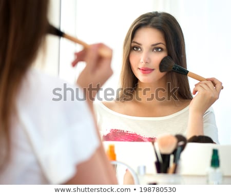 Stock photo: Young Pretty Woman Getting Make Up With Brush