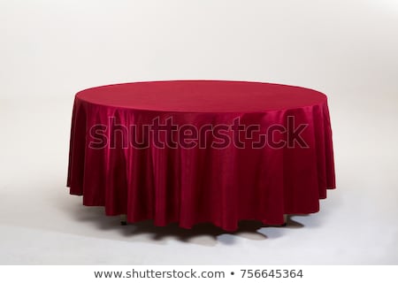 Stok fotoğraf: Round Table With Tablecloth