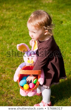 [[stock_photo]]: Colored Easter Eggs On Artificial Grass