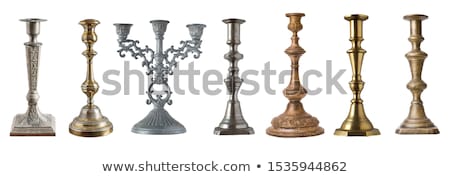 Foto stock: Burning Wax Candle In A Stand