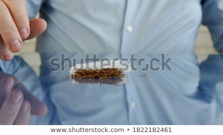 Stock fotó: Dried Cannabis On Rolling Paper With Filter