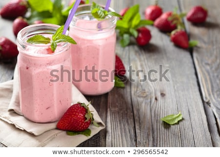 Stockfoto: Red Strawberry Fruit Smoothie In Glass Jars With Straw Mint Leaf Cut Ripe Berry White Wooden Boar