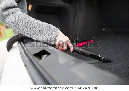 Foto stock: Vacuuming Car Trunk