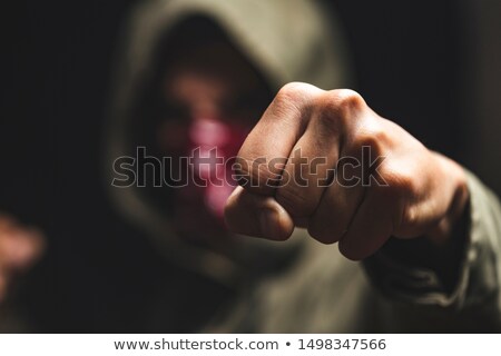 Stock photo: Aggressive Man Punching With Fist Victims Pov