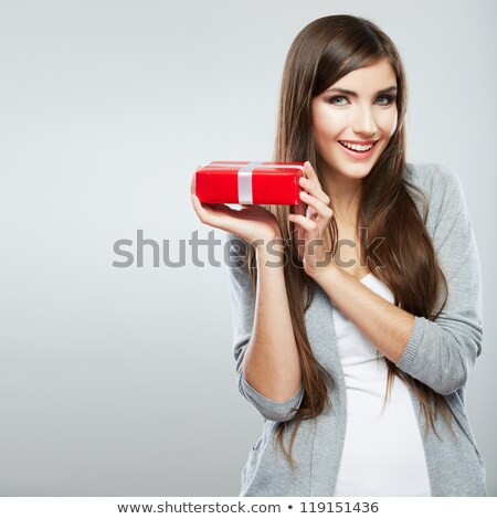 Foto d'archivio: Young Woman Holding Present