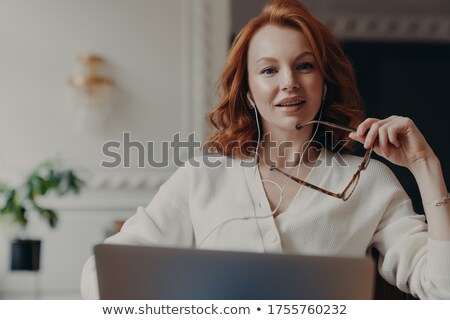 Zdjęcia stock: Successful Redhead Woman Entrepreneur Ready To Conduct Online Negotiations With Coworkers Holds Spe