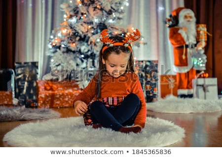 Сток-фото: Three Girls And Snowman In Santas Hat