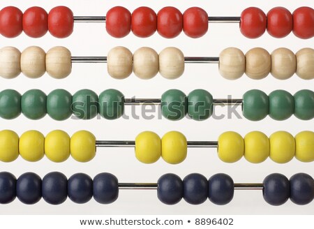 Foto stock: Abacus Caclulator With Colored Beads And Books