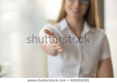 Foto stock: Self Confident Female Doctor Smiling At The Camera