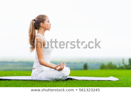 Stok fotoğraf: Yoga Woman On Green Grass