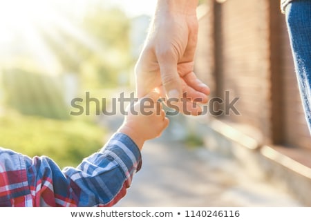 Stockfoto: Hand Adult And Child