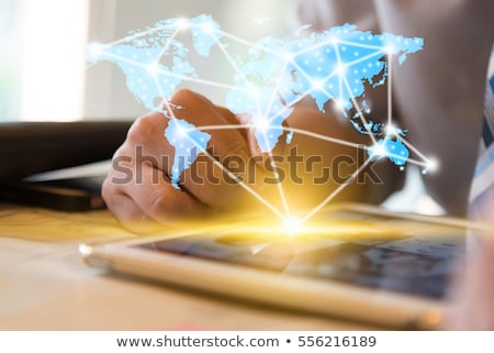 Stok fotoğraf: Person Touching Light Blue Hologram Screen