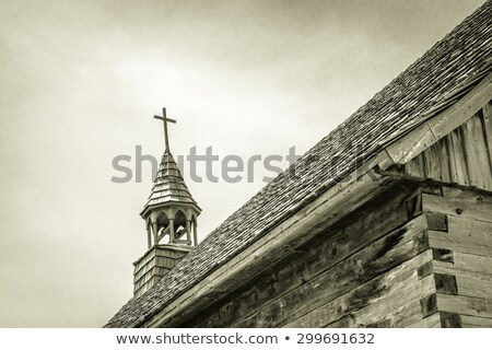 Foto stock: Cross On The Top Of Old Church