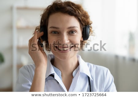 Сток-фото: Close Up Shot Of Woman Wearing Headphones