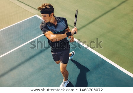 Young Male Tennis Player [[stock_photo]] © Jacob Lund